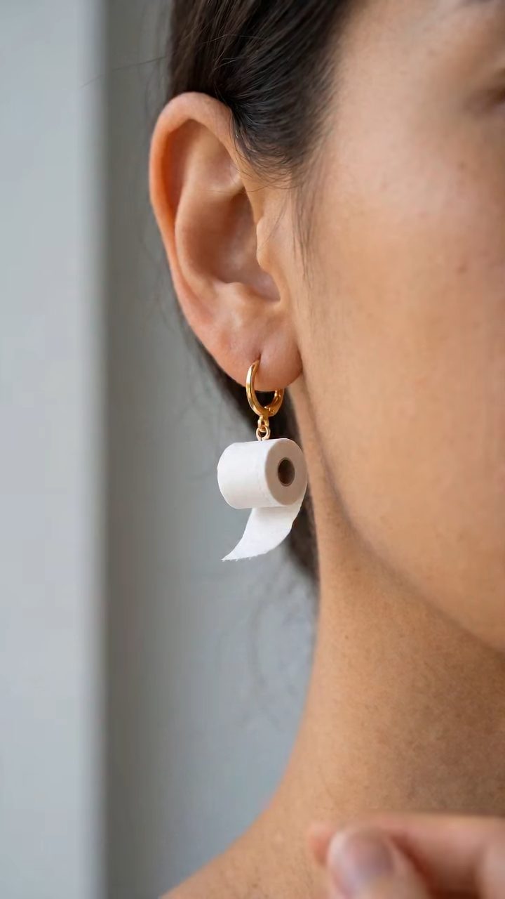 Tiny TP Earring Unfurls