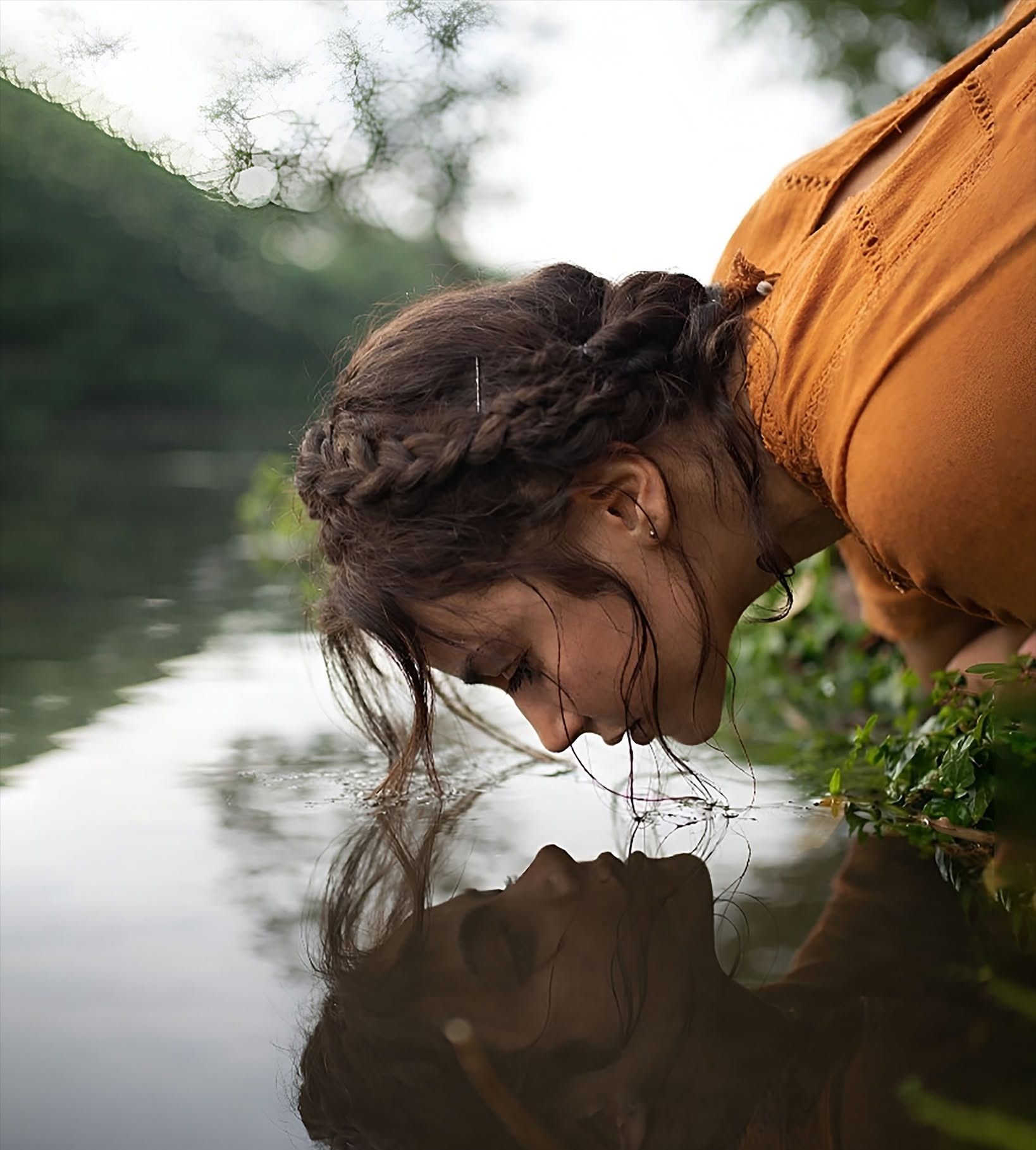 Earthy Woman's Soulful River Reflection
